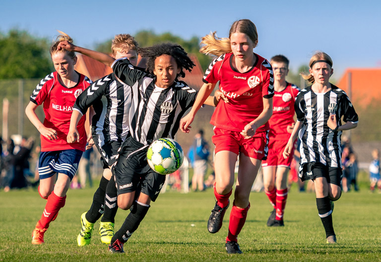 Children playing soccer